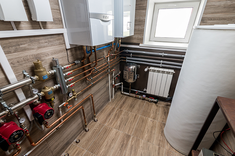 Russia, Moscow- June 11, 2019: interior room apartment. boiler room. heating system, pipes and appliances